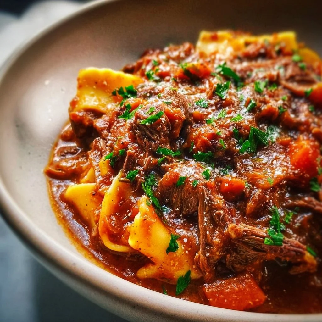 Delicious Beef Ragu served with pasta in a rustic bowl