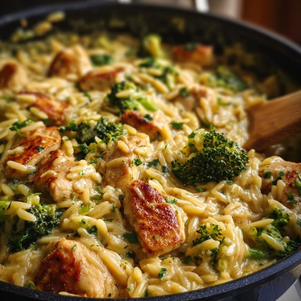Delicious Cheesy Chicken Broccoli Orzo served with cheese and vegetables