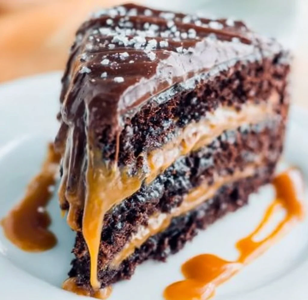 Delicious salted caramel chocolate cake topped with creamy frosting