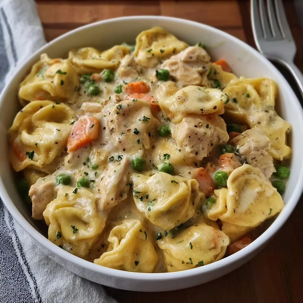 Crockpot Cheddar Chicken Pot Pie Tortellini served in a bowl