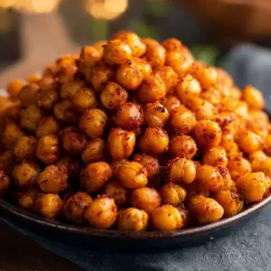 Air fryer garlic paprika chickpeas on a plate, golden and crispy